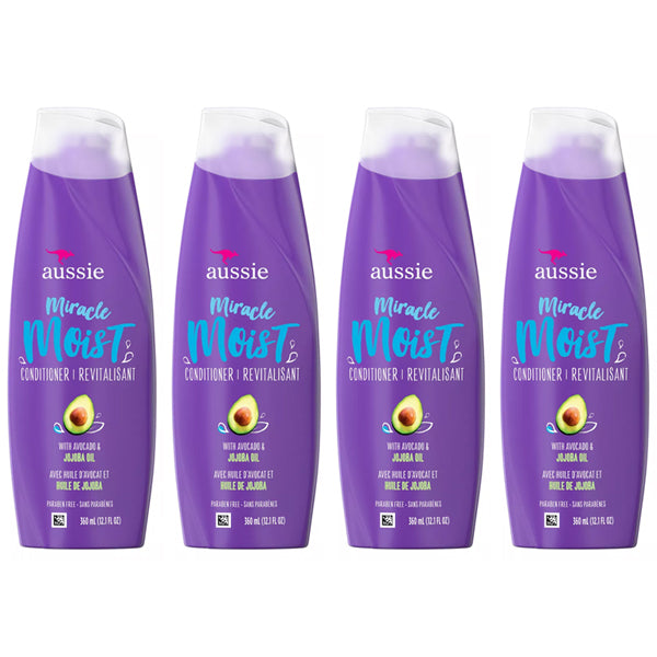 The 4 Pack - Aussie Miracle Moist Conditioner with Avocado & Jojoba Oil 12.1oz features four purple bottles by Aussie, each providing intense hydration for dry hair with avocado and Australian jojoba oil. Signature branding is on the front.